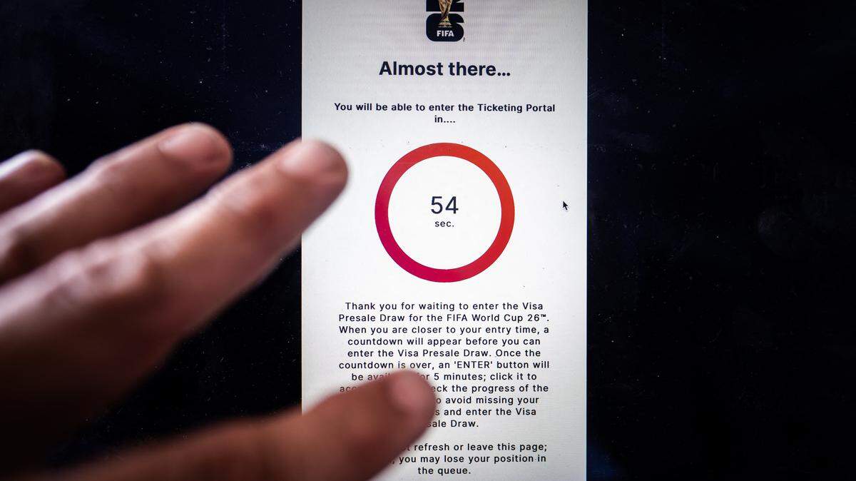This illustration photo shows the countdown clock on FIFA's website for football fans hoping to register for 2026 FIFA World Cup tickets in Mexico City on September 10, 2025. Registration is now open to participate in the ticket lottery for the 2026 FIFA World Cup, which will be held in Mexico, the United States, and Canada, with the opening match taking place at the Azteca Stadium in Mexico City on June 11, 2026. (Photo by CARL DE SOUZA / AFP) (Photo by CARL DE SOUZA/AFP via Getty Images)