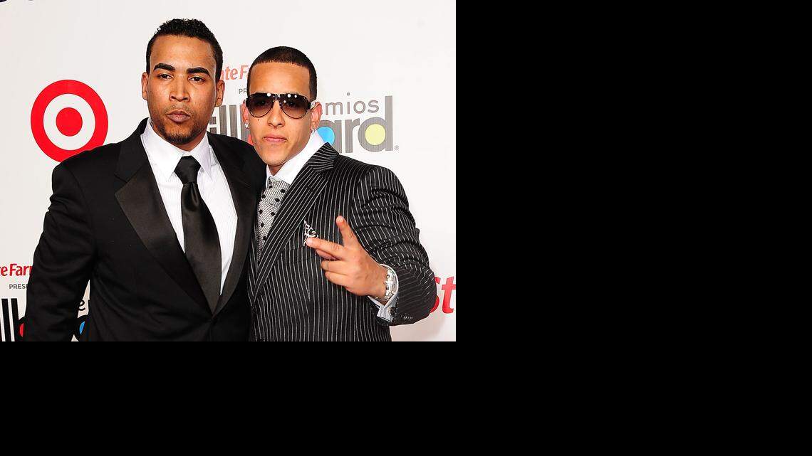Daddy Yankee y Don Omar en una foto de archivo.