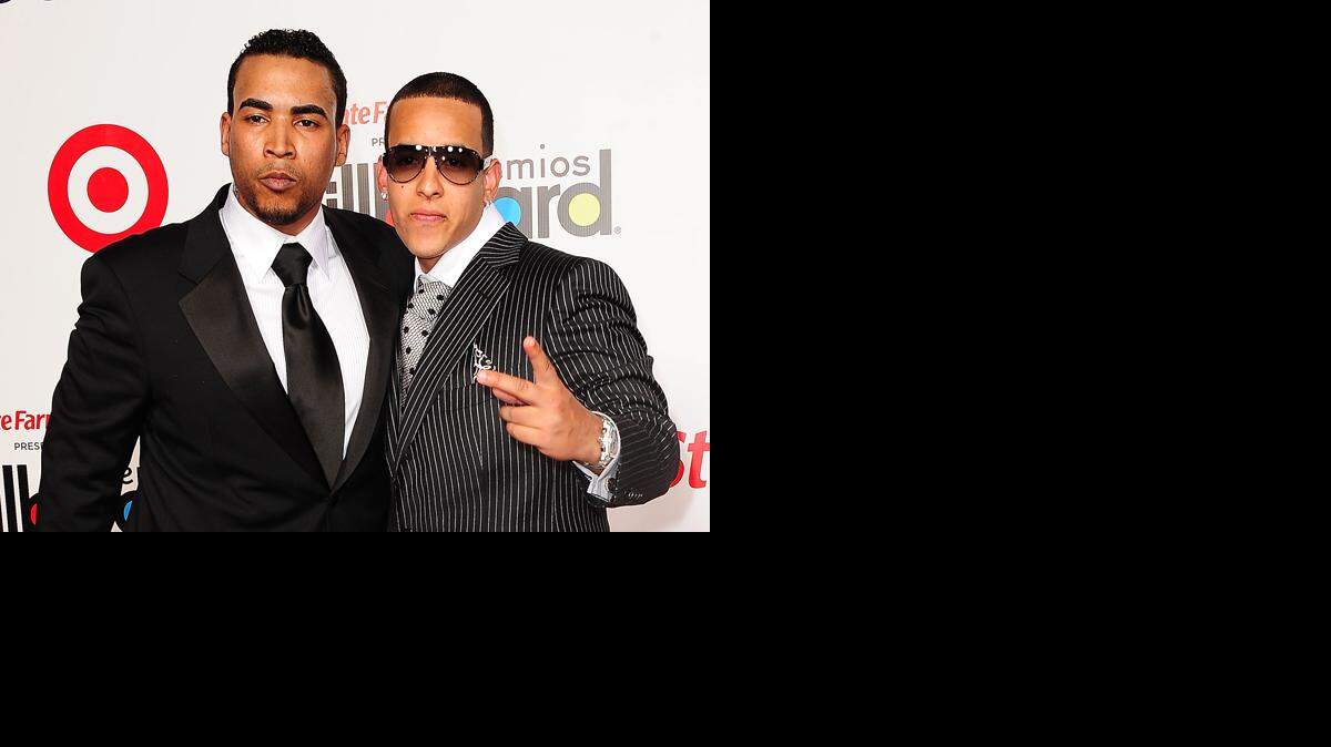 Daddy Yankee y Don Omar en una foto de archivo.