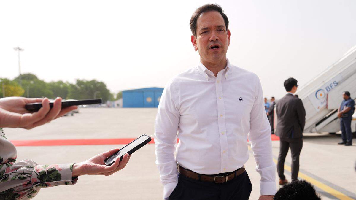 US Secretary of State Marco Rubio speaks to journalists before boarding his plane at Indira Gandhi International Airport in New Delhi on May 25, 2026. (Photo by Julia Demaree Nikhinson / POOL / AFP via Getty Images)