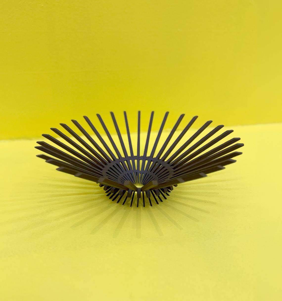 ‘Cosmic Wave #1’, 2011, acero con pátina de óxido, 14 x 14 x 14 pulgadas.