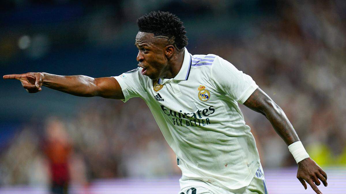 El jugador del Real Madrid Vinicius Jr. celebra tras anotar un gol ante el Manchester Ctiy en el partido de ida de la semifinal de la Liga de Campeones, celebrado el 9 de mayo de 2023 en Madrid.