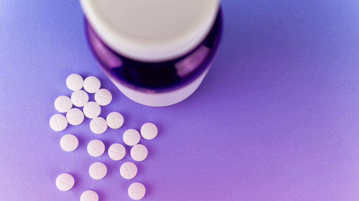 bottle with melatonin pills or food supplements, medicine