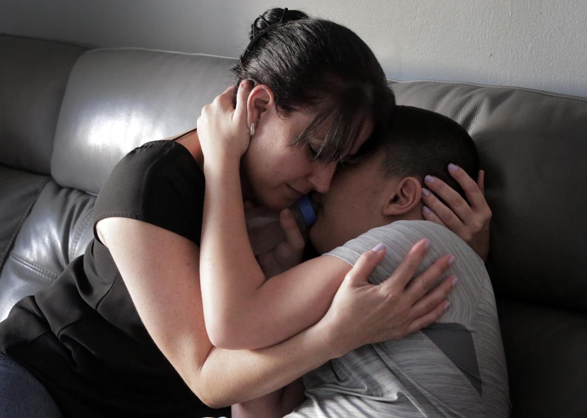 Yordanka Fernández and her son Nicholas, 13, who suffers from cerebral palsy and various other major health issues, at their home in Hialeah.