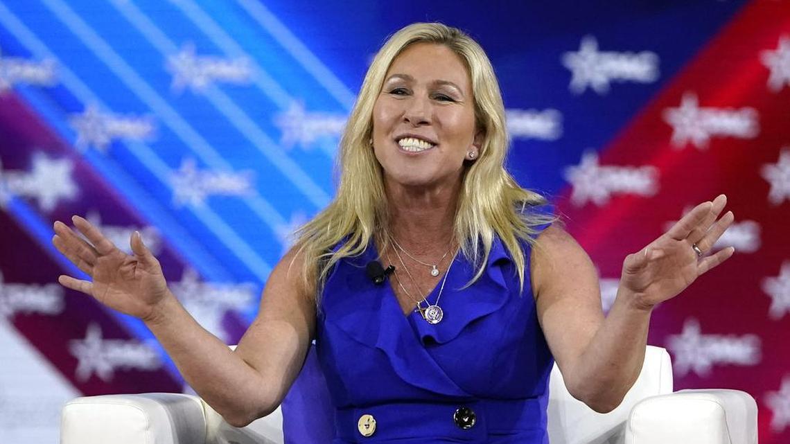 Republican U.S. Rep. Marjorie Taylor Greene, of Georgia, answers questions at CPAC in Orlando. She also spoke at a white-nationalist conference nearby.