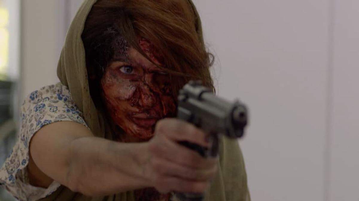 Fotografía de una escena de la telenovela ‘Sin senos sí hay paraíso’ de Telemundo en el que se ve al personaje de ‘la diabla’ tras el atentado.