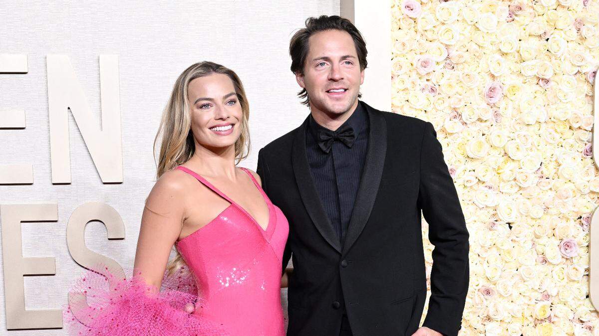 Margot Robbie and Tom Ackerley at the 81st Golden Globe Awards held at the Beverly Hilton Hotel on January 7, 2024 in Beverly Hills, California. (Photo by Gilbert Flores / Golden Globes / Golden Globes via AFP)