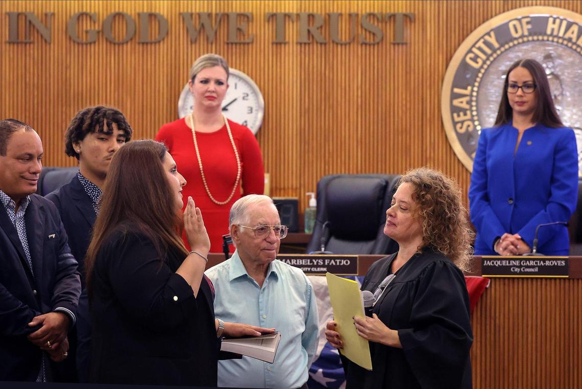 Angelica Pacheco, second from left, takes the oath during the Hialeah Council swearing-in ceremony, after defeating incumbent Vivian Casals-Muñoz. On Monday, November 13, 2023 in Hialeah, Florida.