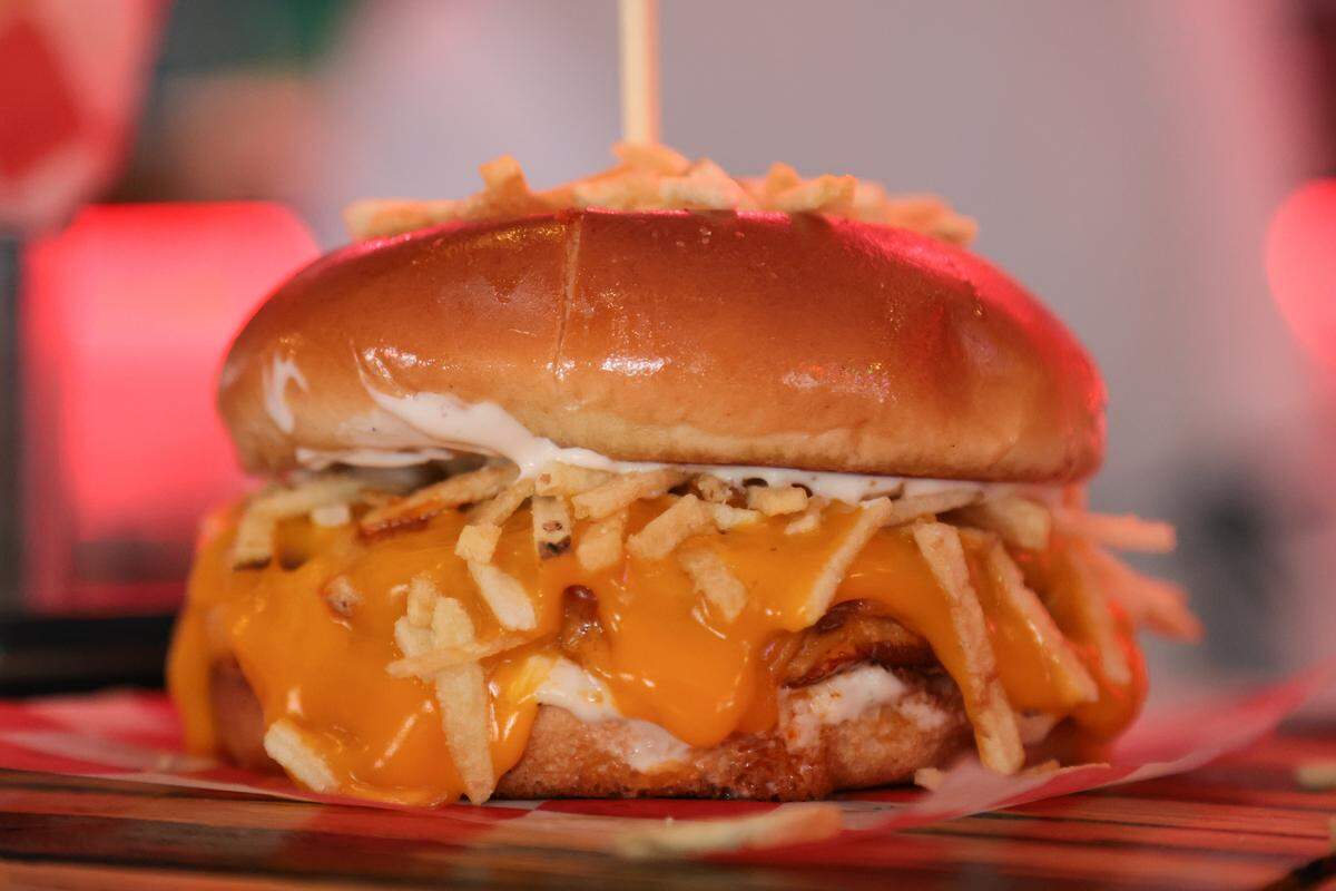 A view of a Frita Cubana, a cuban-style chorizo burger topped with crispy shoestring potatoes, at El Cuban Diner at 1620 SW Eighth St., in Miami, Fla., on Tuesday, Nov. 4, 2025.