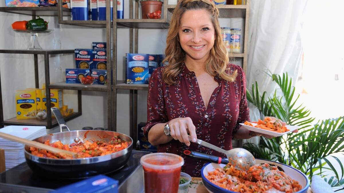 Ingrid Hoffmann cooks at the Food Network & Cooking Channel South Beach Wine & Food Festival in 2016 in Miami Beach.
