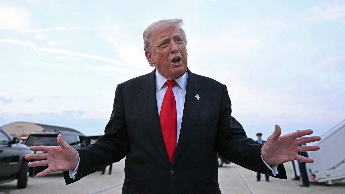 US President Donald Trump speaks with the press upon arrival at Joint Base Andrews in Maryland on November 9, 2025. Trump is returning to Washington DC after spending part of the weekend at his Florida residence of Mar-a-Lago. (Photo by Jim WATSON / AFP) (Photo by JIM WATSON/AFP via Getty Images)          