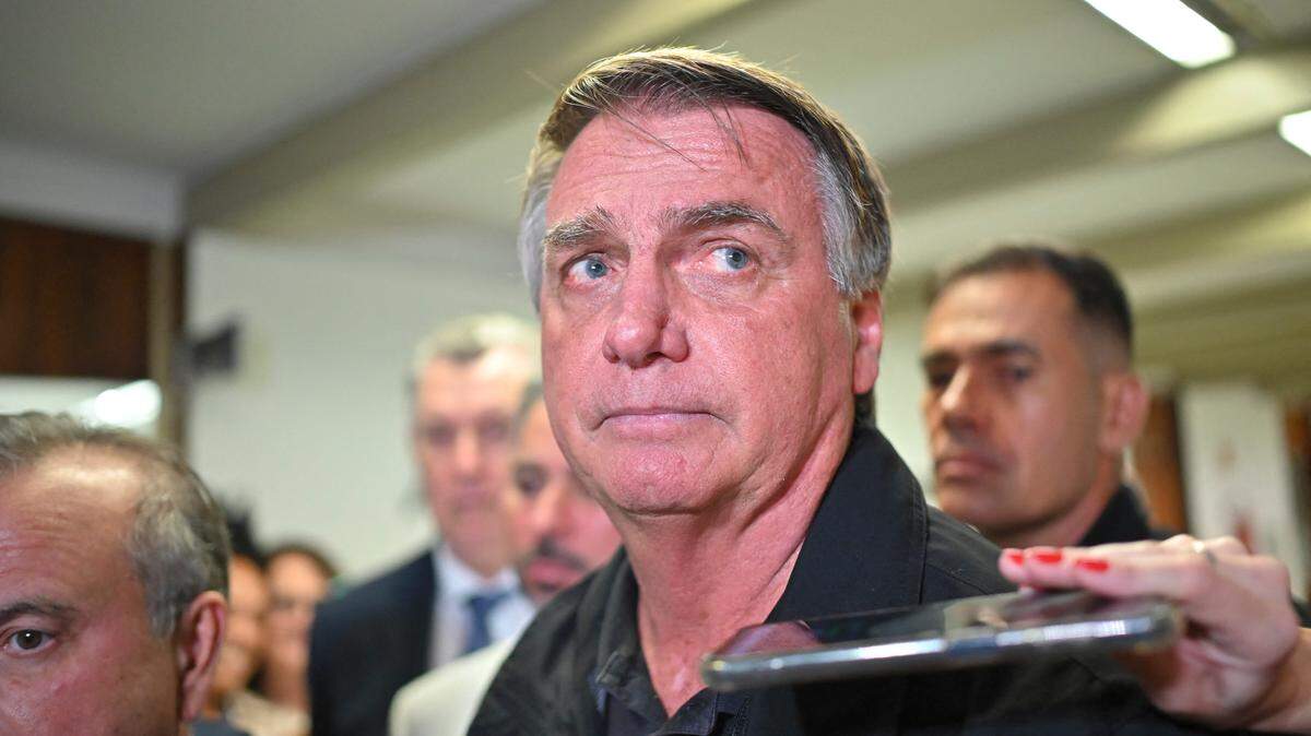 Former Brazilian President Jair Bolsonaro speaks to journalists in Brasilia last week following his indictment.
