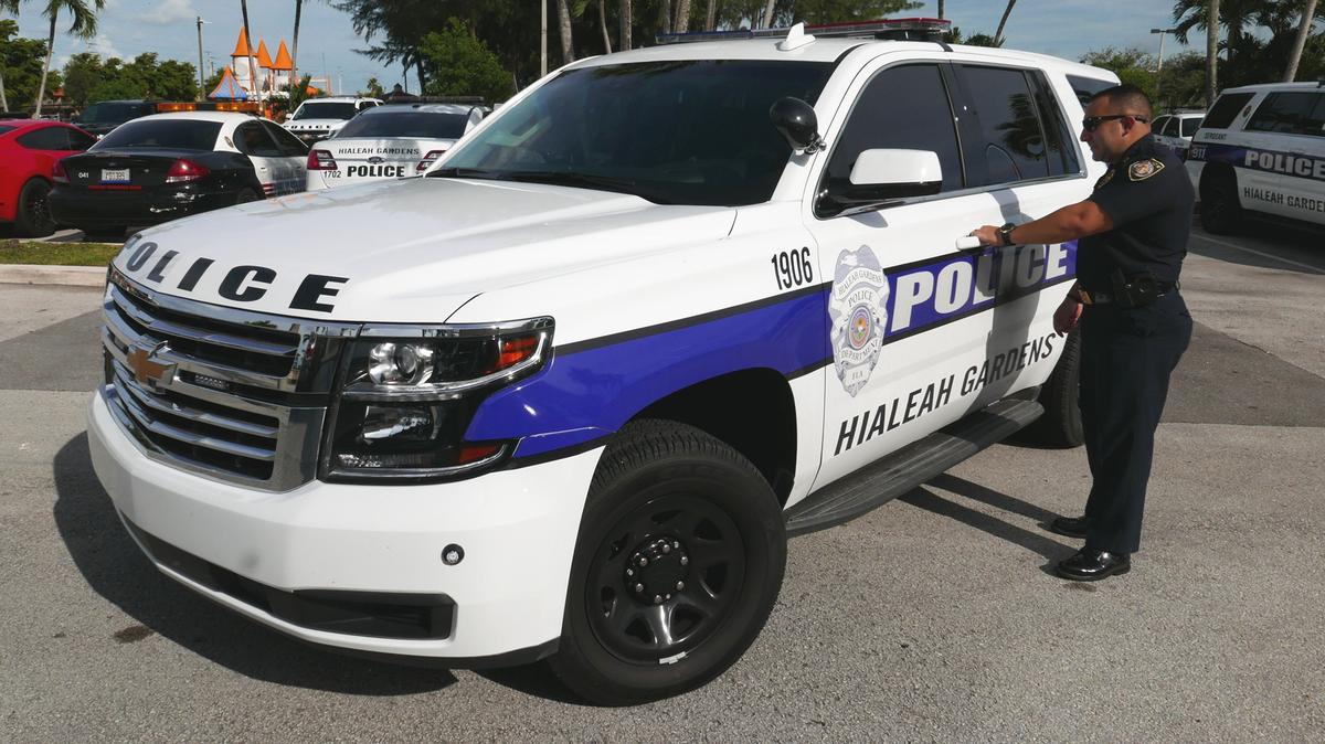 Capt. Michael López, who’s in charge of operations for the Hialeah Gardens Police Department, shows off one of the 15 new Chevrolet Tahoes the department bought.