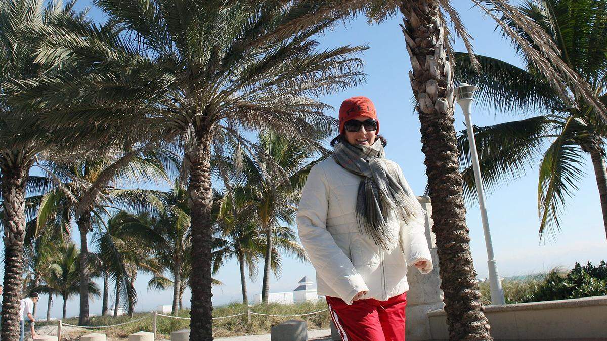 MIAMI BEACH, FL - JANUARY 11: A runner bundles up as she excises on the boardwalk next to the beach on January 11, 2010 in Miami Beach, Florida. The National Weather Service said it recorded 36 degrees in Miami Monday morning, which beat the 82-year-old record of 37 degrees. (Photo by Joe Raedle/Getty Images)