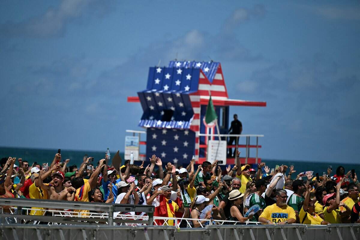 Fans a watch party for the opening match of the 2026 World Cup football tournament in Miami Beach, Florida, on June 11, 2026. (Photo by CHANDAN KHANNA / AFP via Getty Images)