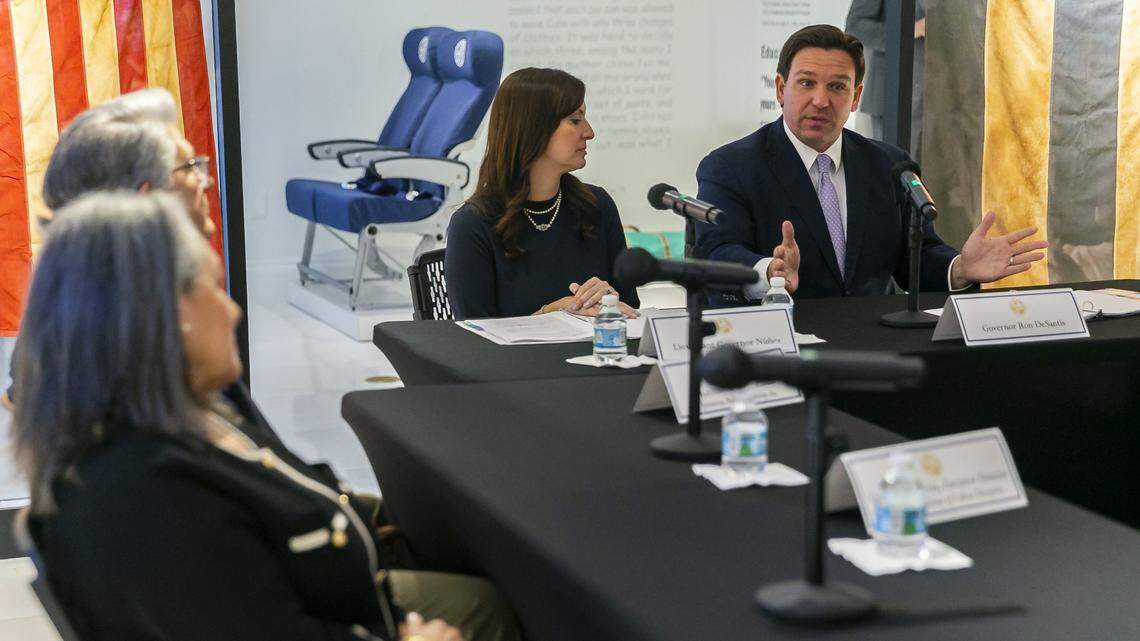 Governor Ron DeSantis, right, and Lieutenant Governor Jeanette Nuñez attend a roundtable discussion at the American Museum of the Cuban Diaspora in Miami’s Coral Way neighborhood on Monday, February 7, 2022.
