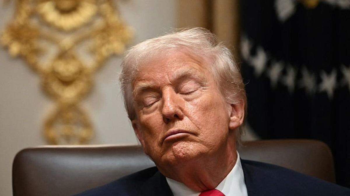 US President Donald Trump attends a Cabinet Meeting in the Cabinet Room of the White House in Washington, DC on December 2, 2025. (Photo by ANDREW CABALLERO-REYNOLDS / AFP via Getty Images)