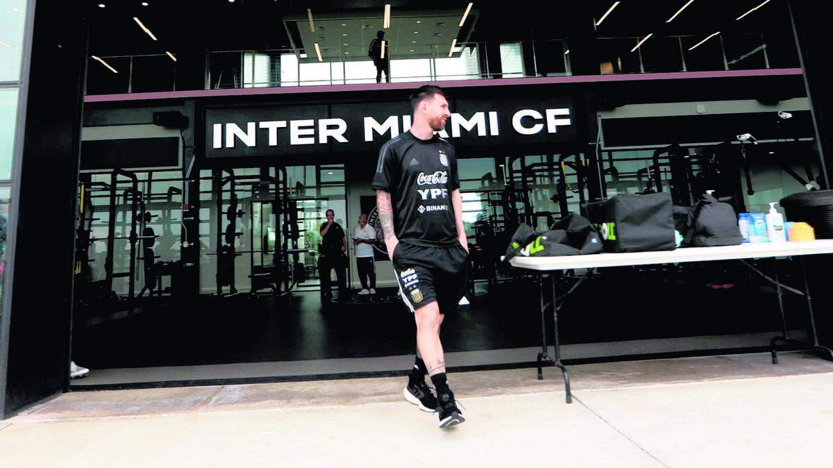 Lionel Messi walks in the Inter Miami entertainment center in Fort Lauderdale.