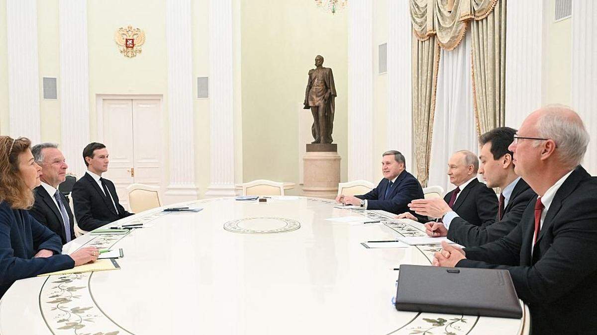 In this pool photograph distributed by the Russian state agency Sputnik, Russia's President Vladimir Putin, accompanied by Kremlin economic envoy Kirill Dmitriev and Kremlin aide Yuri Ushakov, meets with US special envoy Steve Witkoff and US President Donald Trump's son-in-law Jared Kushner at the Kremlin in Moscow on December 2, 2025. (Photo by Kristina Kormilitsyna / POOL / AFP via Getty Images)