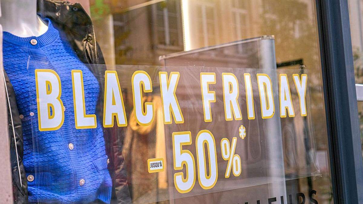 Illustration of a shop window of a clothing and ready-to-wear store with a sticker announcing the Black Friday promotional sales operation with discounts and price reductions of up to -50% in the city center of Nancy, in the department of Meurthe et Moselle in the East of France on November 16, 2024. (Photo by Nicolas Guyonnet / Hans Lucas via AFP) (Photo by NICOLAS GUYONNET/Hans Lucas/AFP via Getty Images)