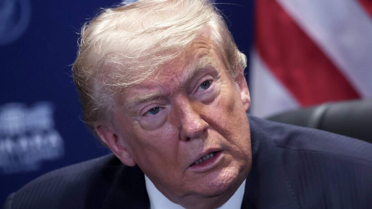 US President Donald Trump reacts as he meets with NATO Secretary General on the sidelines of the NATO summit in Ankara, on July 8, 2026. The summit comes at a fraught time for the 77-year-old transatlantic alliance, with the US President demanding members make good on a pledge to ramp up defence spending as Washington takes a step back from Europe. (Photo by Filip SINGER / POOL / AFP via Getty Images)