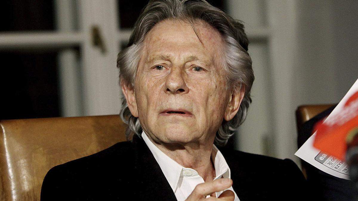 FILE - In this Oct. 30, 2015, file photo, filmmaker Roman Polanski tells reporters he can “breath with relief” after a Polish judge ruled that the law forbids his extradition to the U.S., in Krakow, Poland. The Paris screening of a new French-Italian film “An Officer and a Spy” is going ahead despite a new allegation that its director Roman Polanski raped a woman decades ago. The screening on Tuesday, Nov. 12, 2019 will be attended by the film’s crew (AP Photo/Jarek Praszkiewicz, File)