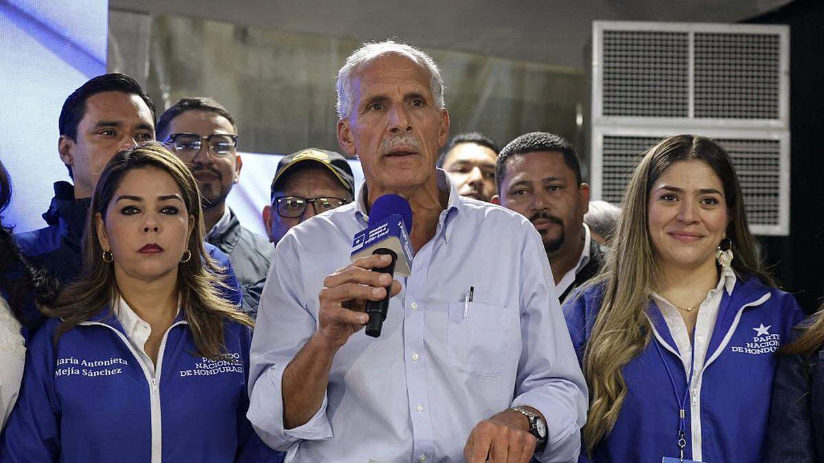 Honduran presidential candidate of the National Party, Nasry Asfura, delivers a speech as he waits for the results of the presidential election in Tegucigalpa on November 30, 2025. (Photo by Lucas AGUAYO / AFP via Getty Images)