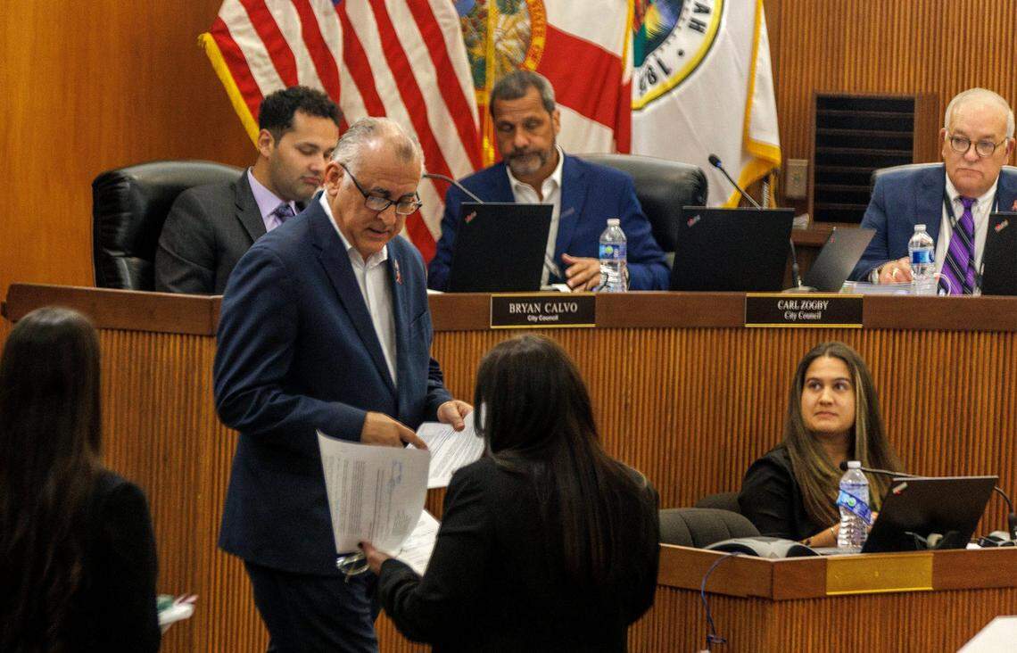 Hialeah Mayor Esteban Bovo Jr. during the city council meeting on Tuesday, October 24, 2023 where he was informed of the lawsuit against him filed by Councilman Bryan Calvo, photographed behind him.