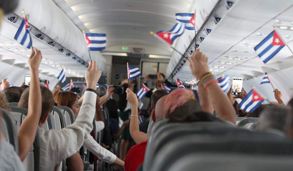 Passengers wave Cuban flags on JetBlue’s inaugural commercial flight to Cuba on Aug. 31, 2016. Now JetBlue wants to add more service to Havana.