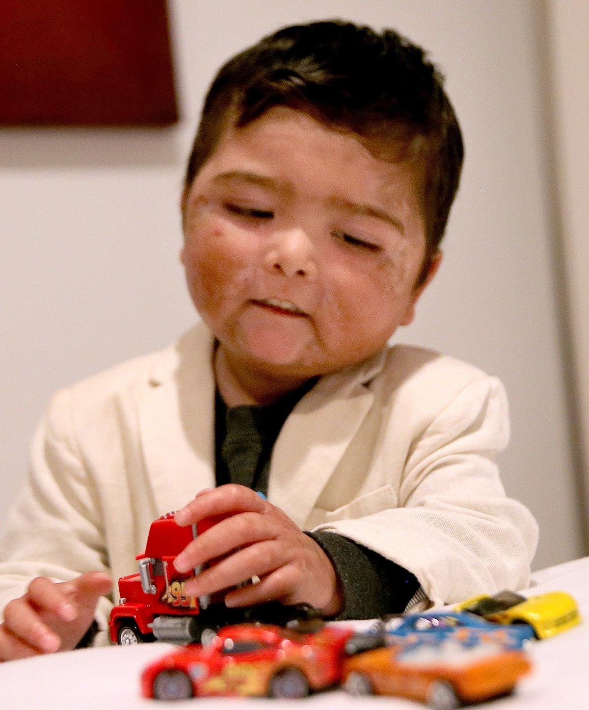 Nicholas Torrico, 4, waits to meet Micah Kadden, the pediatrician who donated life-saving bone marrow to Nicholas.