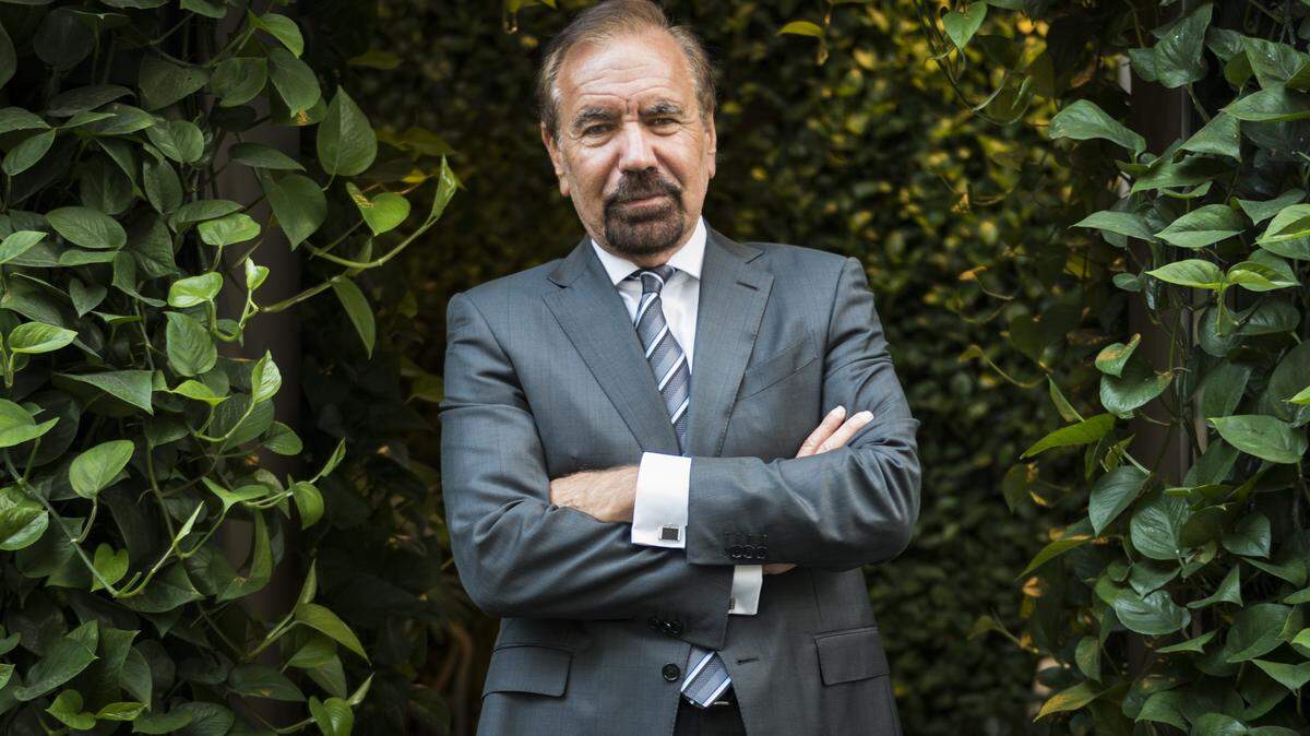 Developer and art patron Jorge Pérez poses at one of his newest Miami projects, the SLS Lux Brickell, in March.