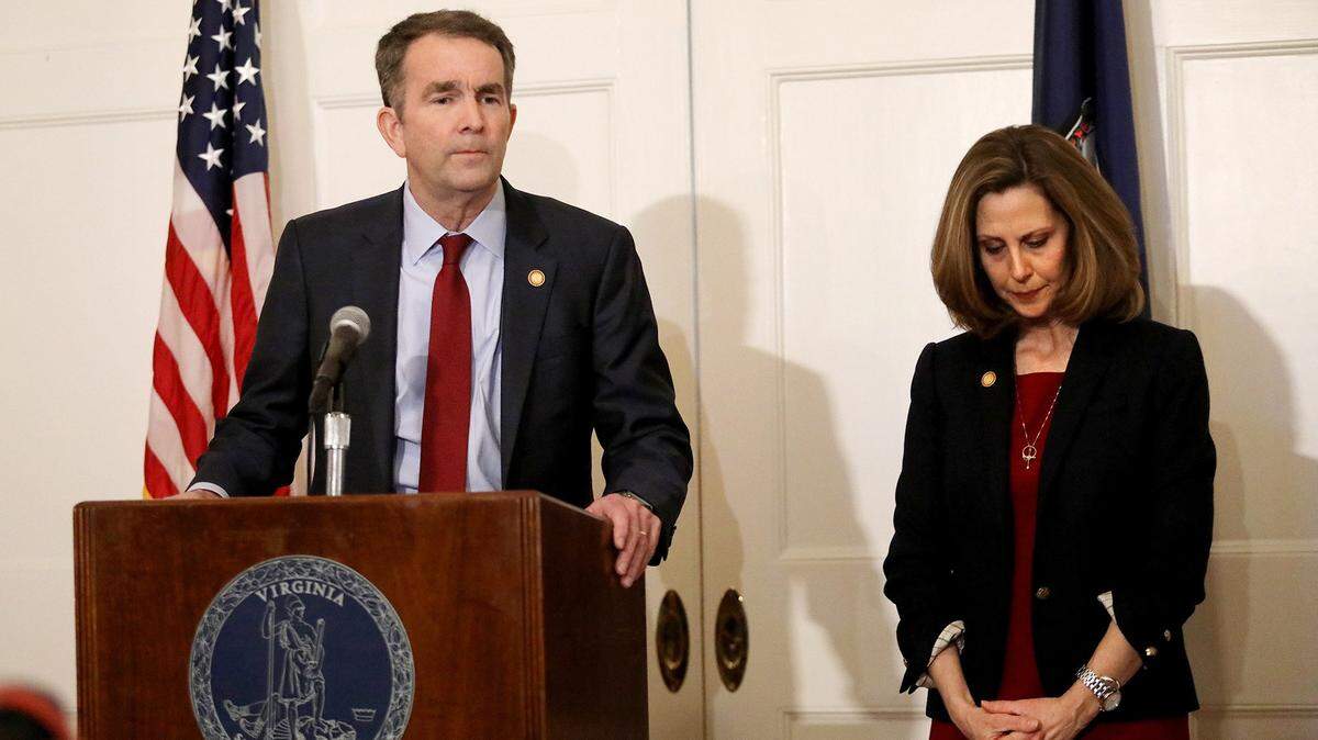 Virginia Gov. Ralph Northam, with his wife Pam at his side, said at a news conference in the Executive Mansion on Saturday, Feb. 2, 2019, that he is not the person in the racist photo in the EVMS yearbook and he will not resign. (Steve Earley/Virginian Pilot/TNS)