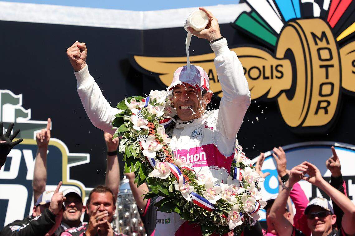 Fort Lauderdale resident Helio Castroneves, formerly of Brazil and Coral Gables, celebrates winning his fourth Indianapolis 500 in Victory Lane on May 30, 2021.