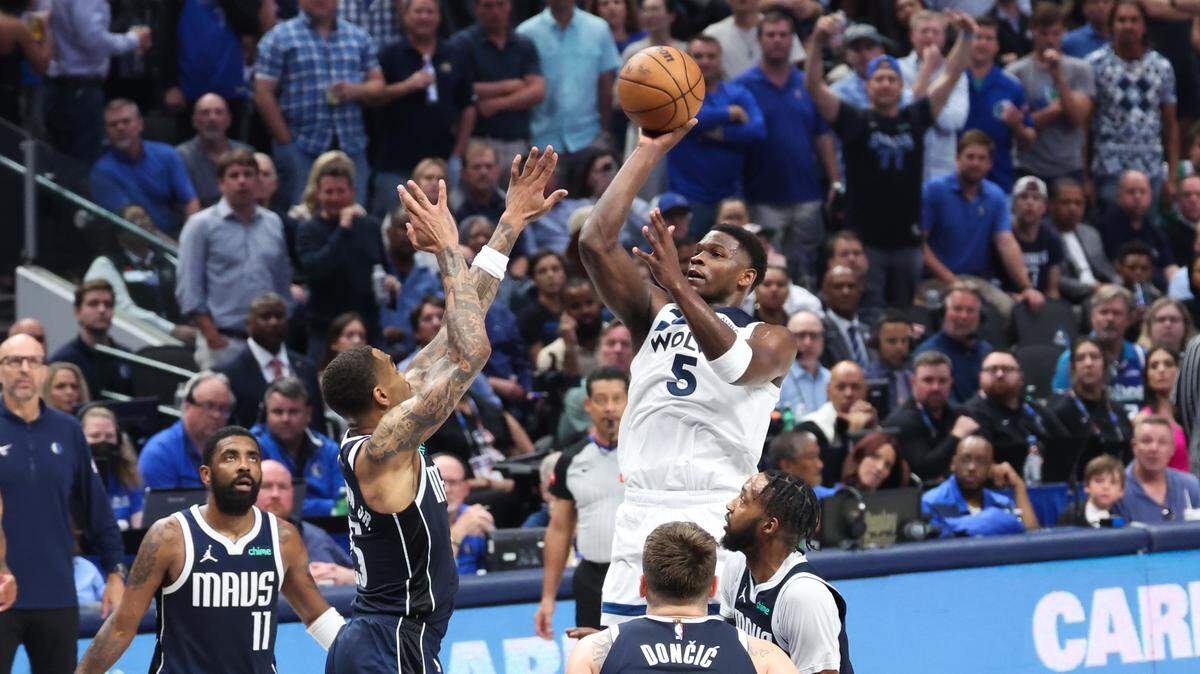 May 28, 2024; Dallas, Texas, USA; Minnesota Timberwolves guard Anthony Edwards (5) shoots over Dallas Mavericks forward P.J. Washington (25) during the second quarter of game four of the western conference finals for the 2024 NBA playoffs at American Airlines Center. Mandatory Credit: Kevin Jairaj-USA TODAY Sports