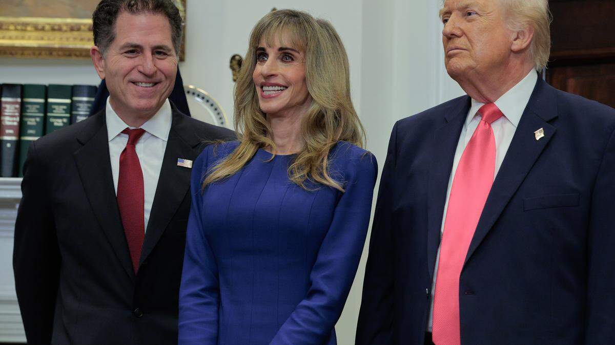 WASHINGTON, DC - DECEMBER 02: Tech billionaires Michael Dell (L) and Susan Dell join U.S. President Donald Trump to make an announcement about "Trump accounts" in the Roosevelt Room at the White House on December 02, 2025 in Washington, DC. The Dells are contributing $6.25 billion of their own money to the program, which aims to have the government provide $1,000 in seed money for investment accounts that will be granted to children born in the next four years. (Photo by Chip Somodevilla/Getty Images)