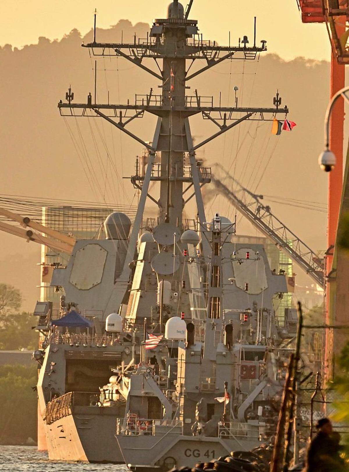 The USS Gravely warship is pictured docked at the port of Port of Spain on October 27, 2025. Trinidad and Tobago Prime Minister Kamla Persad-Bissessar on Monday rejected a threat by neighboring Venezuela to pull the plug on a joint gas project over her government's hosting of an American warship. (Photo by MARTIN BERNETTI / AFP) (Photo by MARTIN BERNETTI/AFP via Getty Images)