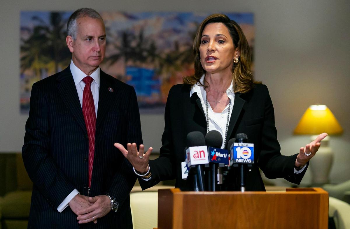 Rep. Maria Elvira Salazar, R-Fla., right, and Rep. Mario Diaz-Balart, R-Fla., hold a press conference about the Cuban Family Reunification Program at the Miami International Airport in Miami, Florida, on Monday, April 19, 2021.