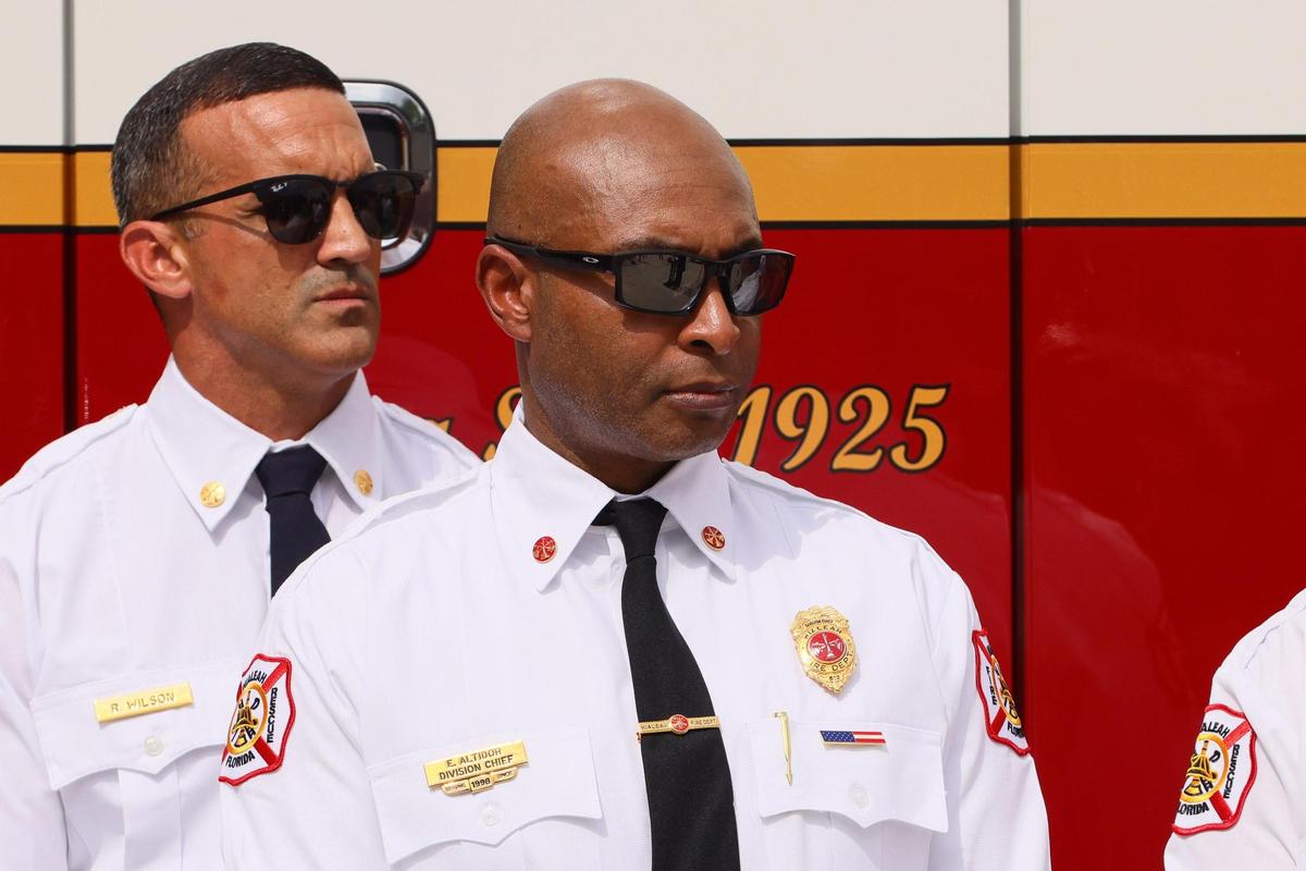 Hialeah Fire Department Division Chief Edward Altidor attended the unveiling ceremony of three new fire rescue trucks at Hialeah Fire Station 1 on Oct. 29, 2024. He is currently involved in an Internal Affairs investigation stemming from a complaint that he had an unfair advantage in the battalion chief examination for eligibility for that position.