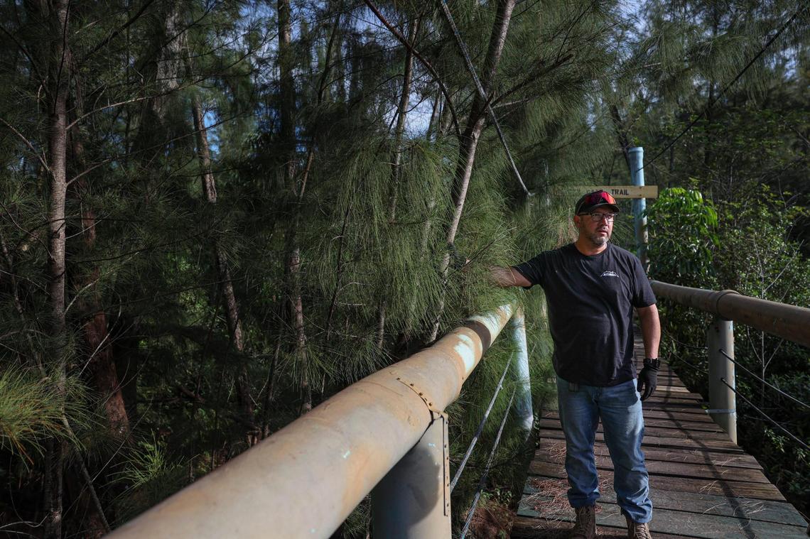 Trails grounds manager Tony Suarez shows the elevated mountain bike routes at Amelia Earhart Park north of Hialeah, on Dec. 21, 2022.