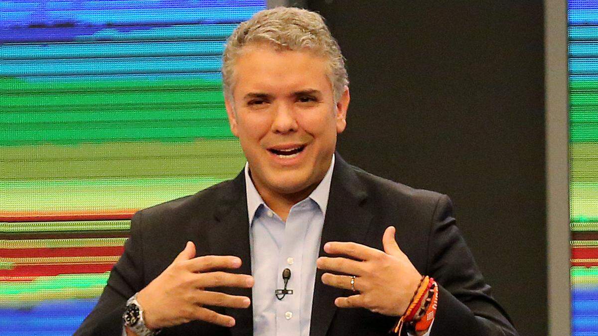 El entonces candidato presidencial Iván Duque habla en un debate electoral el 19 de abril de 2018, en Bogotá, Colombia.