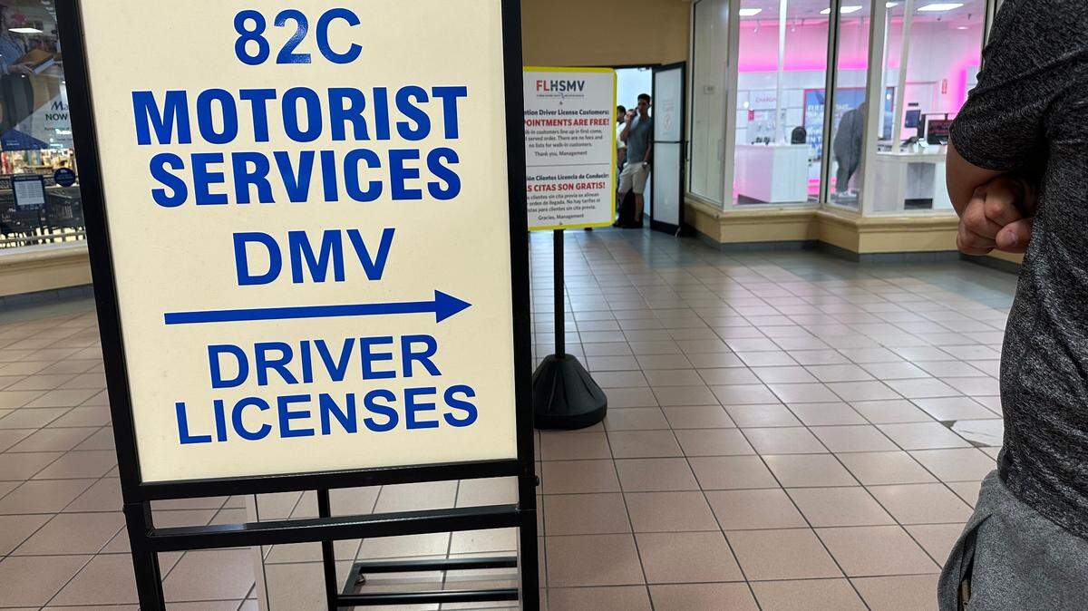 The driver’s license office inside the Midway Crossings shopping center attracts a line of motorists applying for or renewing licenses on May 30, 2024.