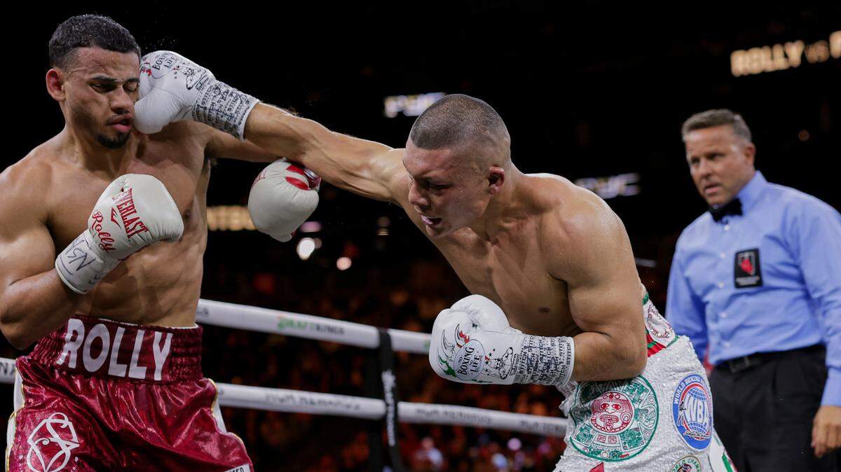Isaac Cruz (der.) disfrutó el sábado en la noche de la mejor victoria de su carrera profesional al convertirse en campeón de las 140 libras, en la versión de la Asociación Mundial del Boxeo, al vencer al cubanoamericano Rolando “Rolly’’ Romero. 