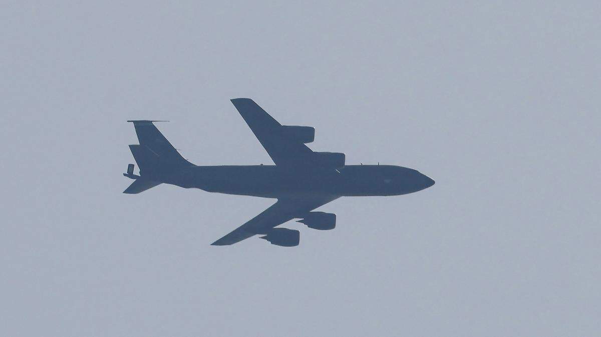 A US Air Force Boeing KC-135 Stratotanker aerial-refuelling aircraft flies over Tel Aviv on March 4, 2026. Israel launched fresh strikes on Iran and Lebanon, where state media reported a residential building was hit on March 4, as Iran's Guards said they had sealed off one of the world's most vital shipping routes for energy. (Photo by JACK GUEZ / AFP via Getty Images)