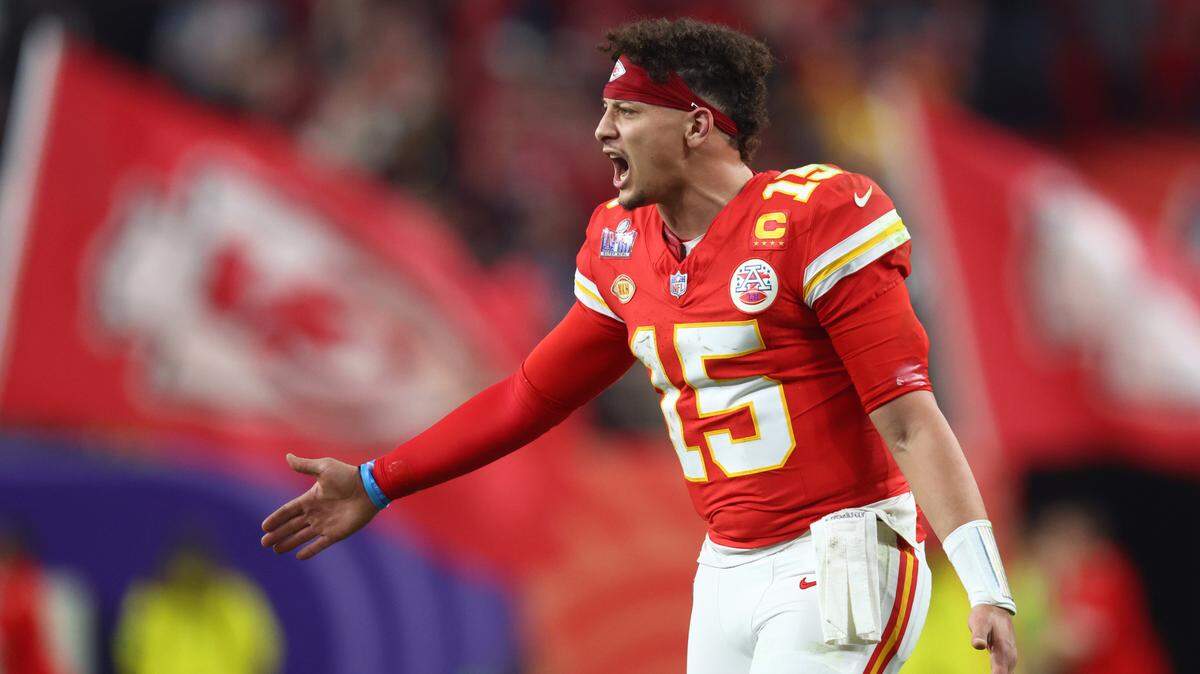Patrick Mahomes celebrates his 3-yard scoring pass to Mecole Hardman with three seconds left in overtime as his Kansas City Chiefs come back to beat the San Francisco 49ers 25-22 on Sunday in Super Bowl LVIII in Las Vegas.