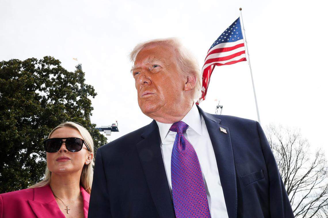 President Donald Trump speaks to reporters alongside White House Press Secretary Karoline Leavitt as he departs for Marine One on the South Lawn of the White House on March 11, 2026 in Washington, DC. President Trump is traveling to Ohio and Kentucky today to highlight two local businesses. (Photo by Win McNamee/Getty Images)