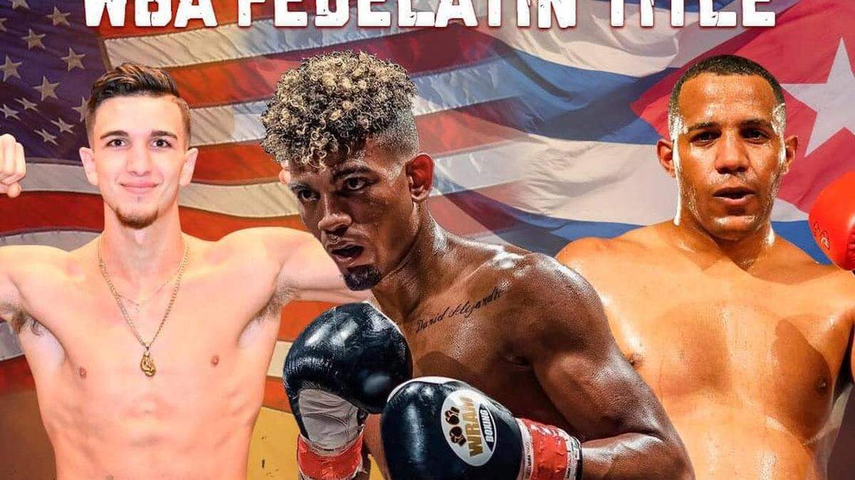 Los boxeadores cubanos Idalberto Umara (centro) y Herich Ruiz (der.) retornan al Caribe Royale de Orlando, Florida, convencidos de que son parte del futuro de este deporte y decididos a impresionar a los aficionados.