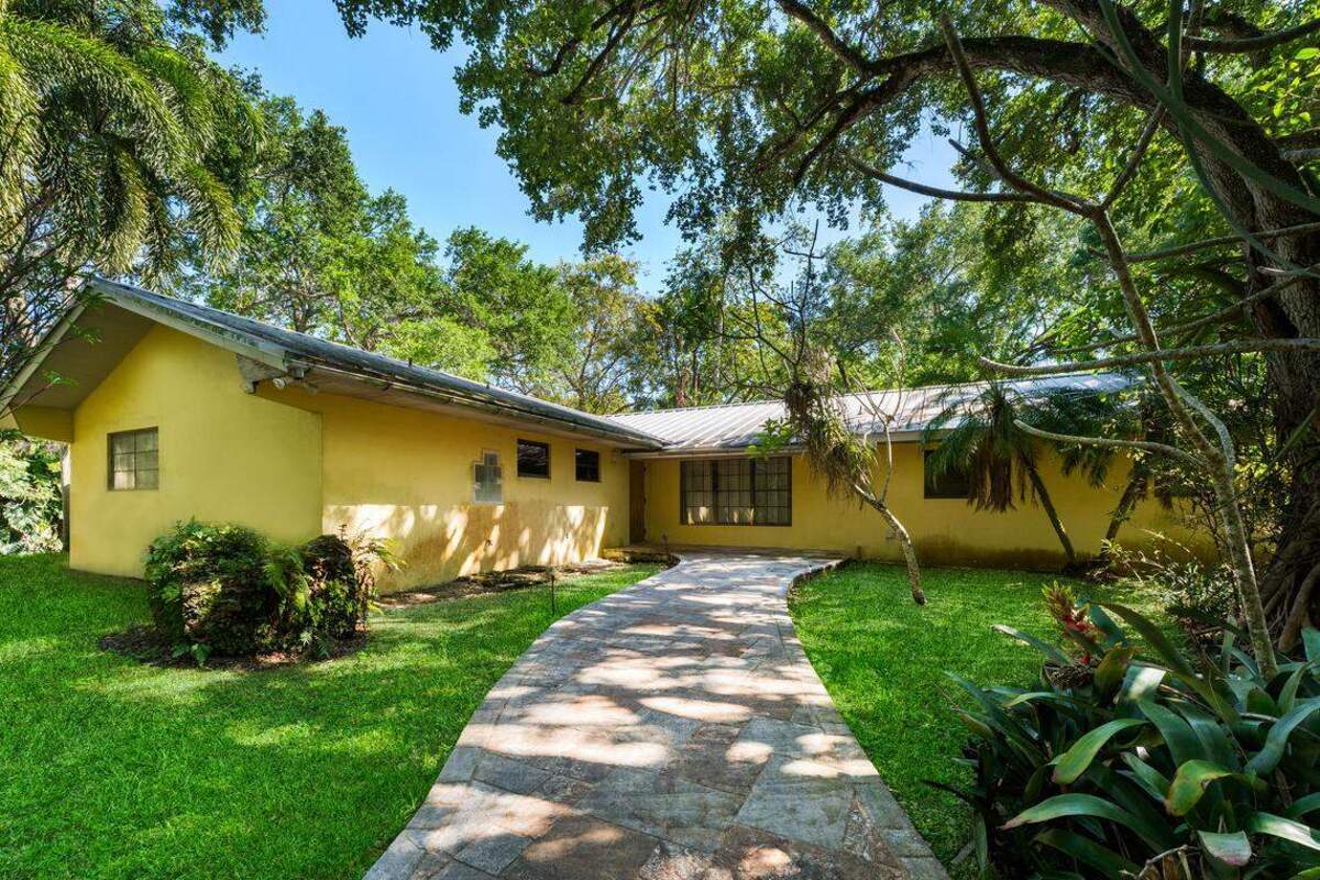 La casa en Breezy Oaks es una casa de campo de tres dormitorios y tres baños, con 3,362 pies cuadrados. Jill Eber/1 Oak Studios