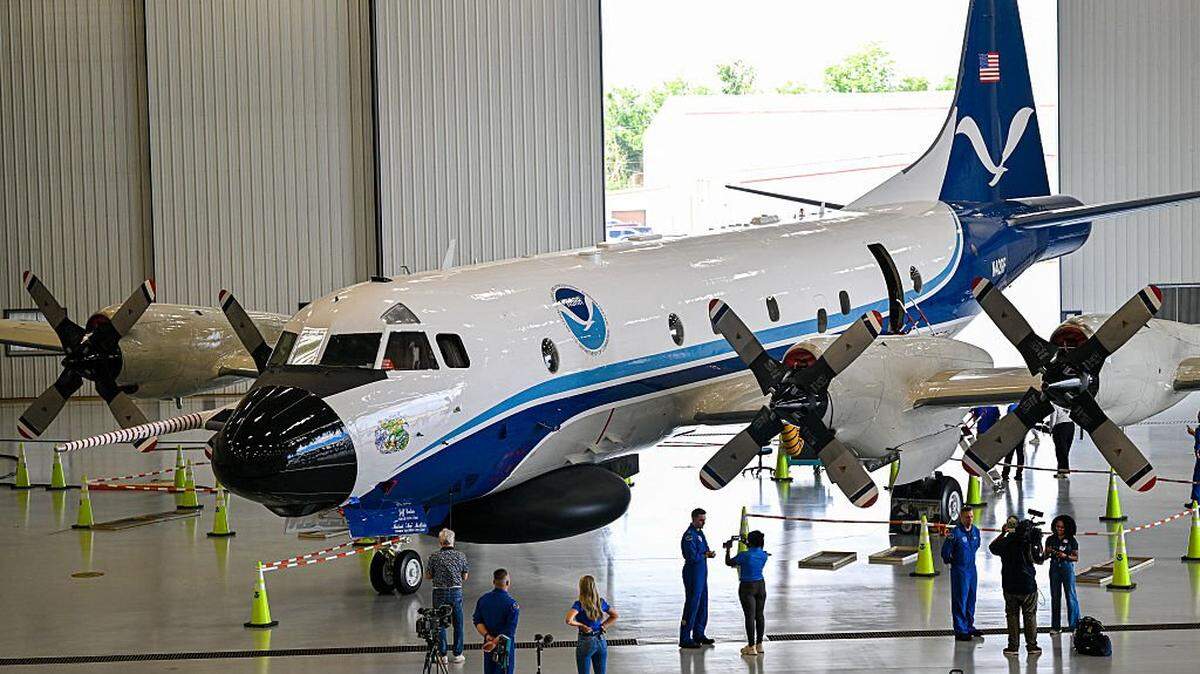 A view of the exterior NOAA WP-3D Orion Hurricane Hunter research plane during a media day at the National Oceanic and Atmospheric Administration's (NOAA) Aircraft Operations Center in Lakeland, Florida, on May 6, 2025. (Photo by Miguel J. Rodriguez Carrillo / AFP) (Photo by MIGUEL J. RODRIGUEZ CARRILLO/AFP via Getty Images)