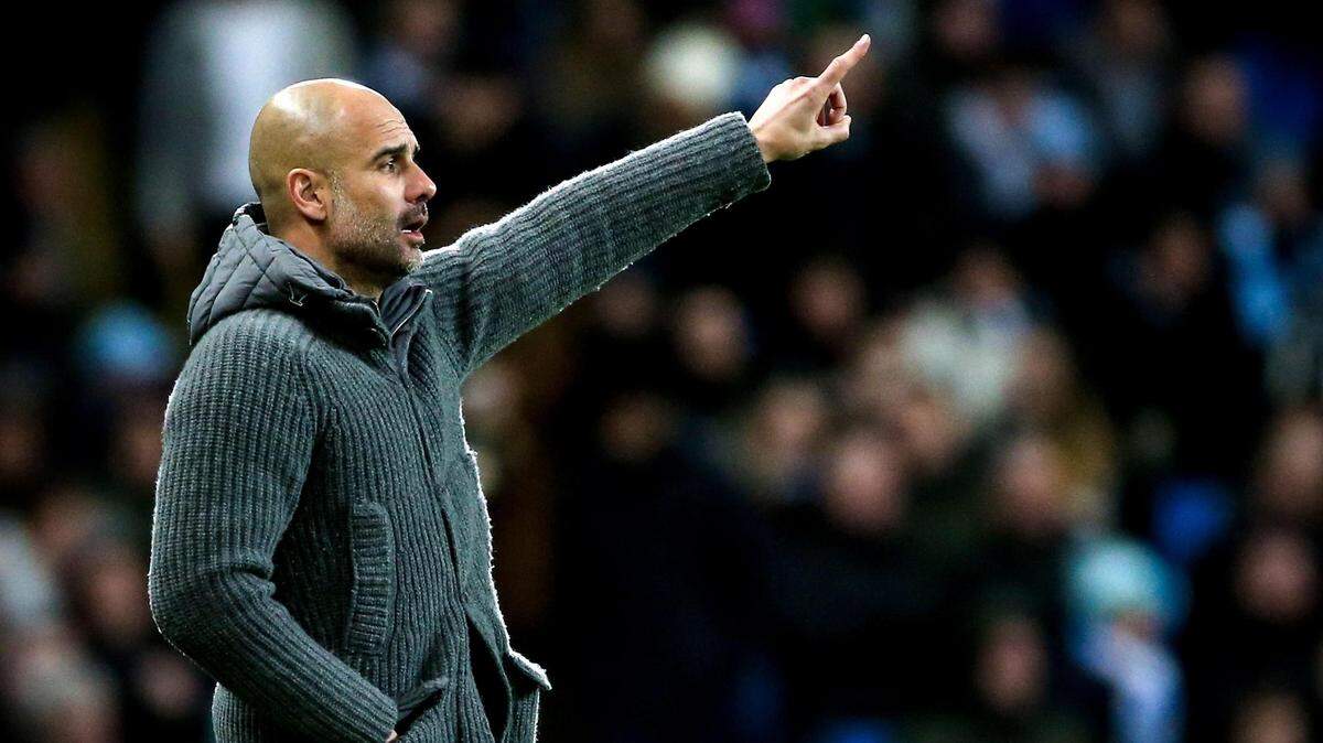 El entrenador de Manchester City, Pep Guardiola, reacciona durante un partido ante el Schalke 04 en la Liga de Campeones, el 12 de marzo de 2019.