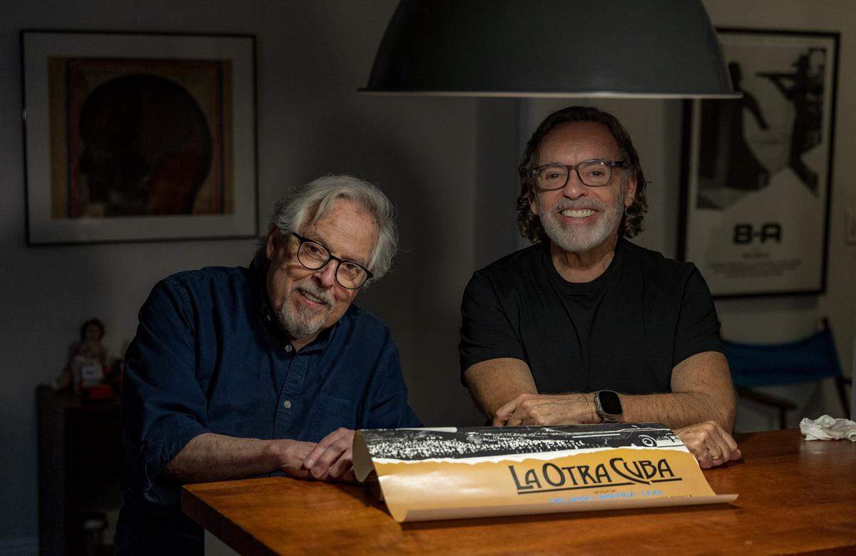 Film critic Alejandro Rios (right) and Cuban American film director Orlando Jiménez Leal posed at Orlando's home in Miami as they talked about Leal's documentary La Otra Cuba (The Other Cuba, 1983), that will be presented by Mr. Rios, as part of the Cuban Cinema Series by by Miami Dade College's (MDC) Miami Film Festival, marking 40 years since the documentary first screened at the 2nd Miami Film Festival in 1985, at the Koubek Center, on Wednesday, January 14, 2026.